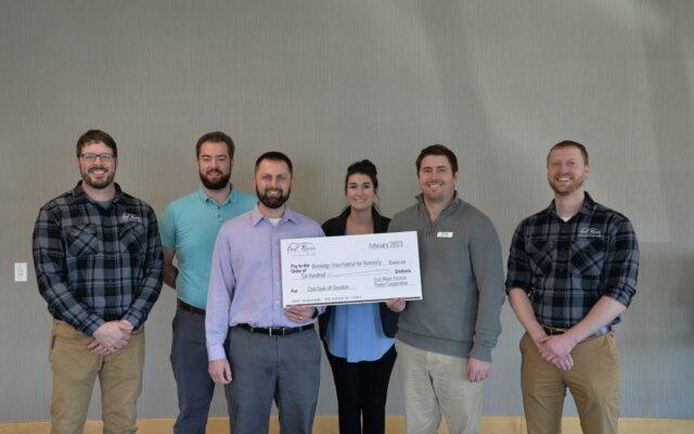 East River Electric Employees make donation to Habitat for Humanity